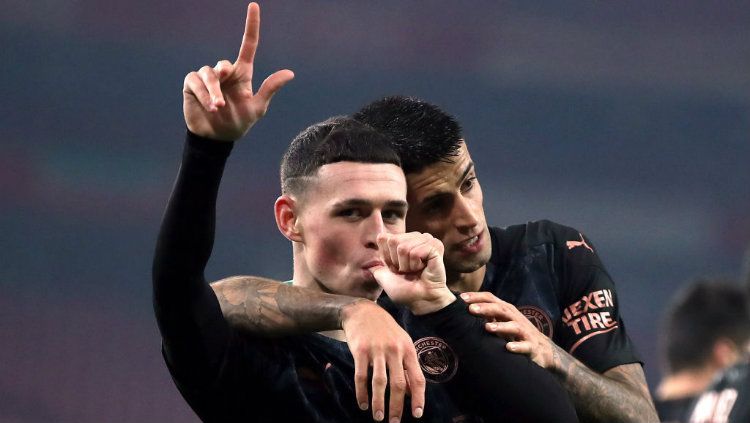 Selebrasi gol Phil Foden di laga Arsenal vs Manchester City. Copyright: © Nick Potts/PA Images via Getty Images