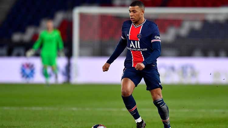 Kylian Mbappe resmi mengangkangi rekor istimewa milik Lionel Messi usai mencetak gol dalam laga Liga Champions antara Paris Saint-Germain (PSG) vs Barcelona. Copyright: © Aurelien Meunier - PSG/PSG via Getty Images