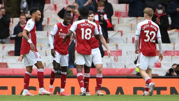 Arsenal merayakan gol ke gawang Brighton & Hove Albion pada laga pamungkas pekan ke-38 Liga Inggris 2020-2021, Minggu (24/05/21) malam WIB. Copyright: © Mike Hewitt/Getty Images