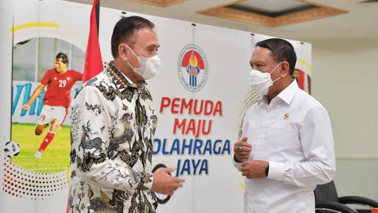 Ketua Umum PSSI melakukan rapat koordinasi dengan Menpora Zainudin Amali pada Senin (24/5) di kantor Kemenpora, Jakarta. Pertemuan ini membahas persiapan dan izin kompetisi Liga 1 dan 2 2021-2022. Copyright: © PSSI