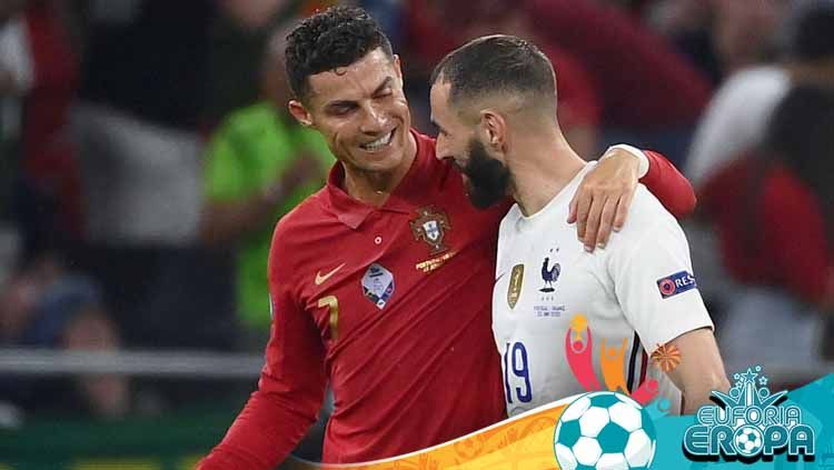 Cristiano Ronaldo dan Karim Benzema saat laga Portugal vs Prancis Euro 2020. Copyright: © FRANCK FIFE/POOL/AFP via Getty Images