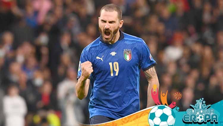 Usai Italia resmi keluar sebagai juara Euro 2020, sang pemain bertahan, Leonardo Bonucci langsung meneriakan jargon 'It's Coming to Rome'. Copyright: © Claudio Villa/Getty Images