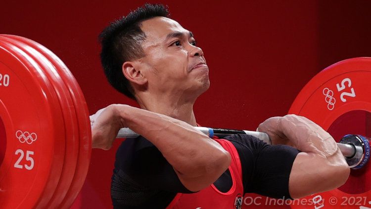 Lifter Indonesia, Eko Yuli di Olimpiade Tokyo 2020. Copyright: © NOC Indonesia