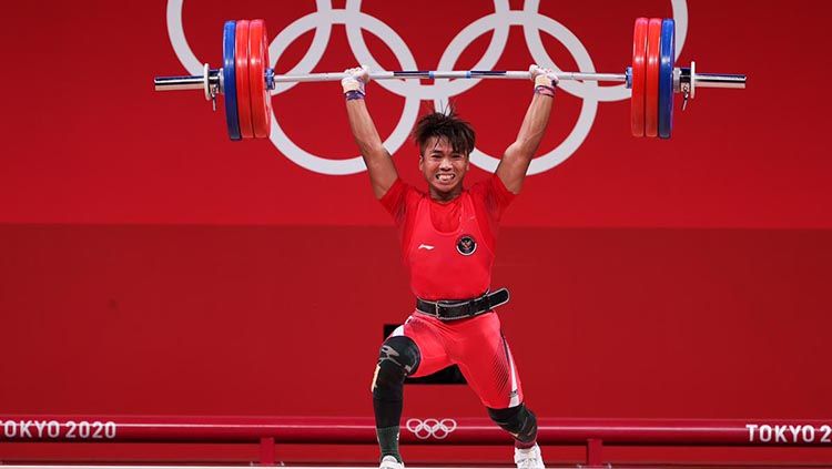 Lifter Indonesia, Deni, di Olimpiade Tokyo 2020/ Copyright: © NOC Indonesia