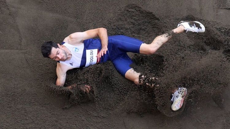 Atlet lompat jauh asal Yunani, Miltiadis Tentoglou. Copyright: © Olympics