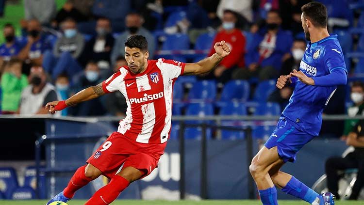 Aksi Luis Suarez di laga LaLiga Spanyol Getafe vs Atletico Madrid. Copyright: © REUTERS