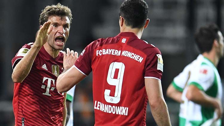 Thomas Muller dan Robert Lewandowski. Copyright: © REUTERS