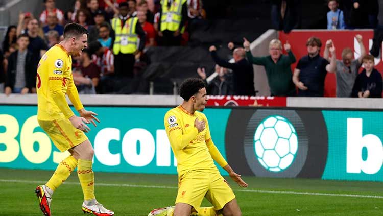 Selebrasi Curtis Jones di laga Brentford vs Liverpool. Pemain 22 tahun itu baru saja membawa Timnas Inggris juara Euro U-21. Copyright: © REUTERS