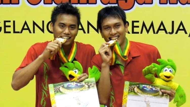 Duet Tontowi Ahmad/Mohammad Ahsan sukses raih medali emas dalam PON XVIII Riau pada tahun 2012 Copyright: © pbdjarum.org