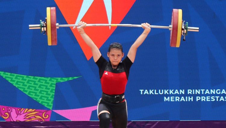 Lifter Putri Jawa Barat, Tsabita Alfiah R peraih 3 rekor di PON XX Papua. Copyright: © PB PON XX Papua - Dadang Tri