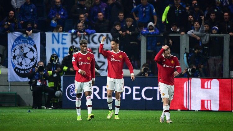 Cristiano Ronaldo merayakan gol Manchester United ke gawang Atalanta pada laga ke-4 Grup F Liga Champions 2021/22, Rabu (03/11/21). Copyright: © REUTERS/Alberto Lingria