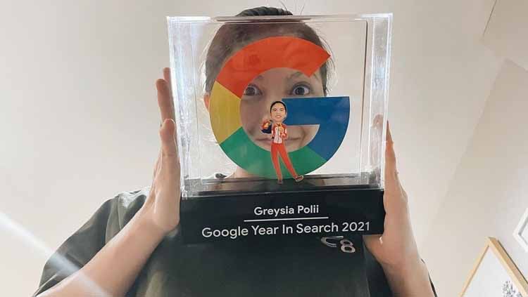 Pebulutangkis nasional, Greysia Polii, mendapatkan penghargaan Google Year in Search 2021 seiring dengan melejitnya prestasi dan popularitasnya di dunia maya. Copyright: © greyspolii
