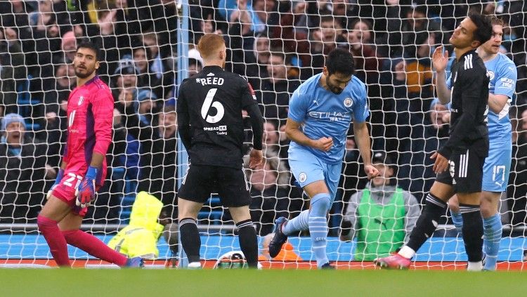 Ilkay Gundogan merayakan gol di laga Piala FA Manchester City vs Fulham (05/02/22). (Foto: Reuters/Jason Cairnduff) Copyright: © Reuters/Jason Cairnduff