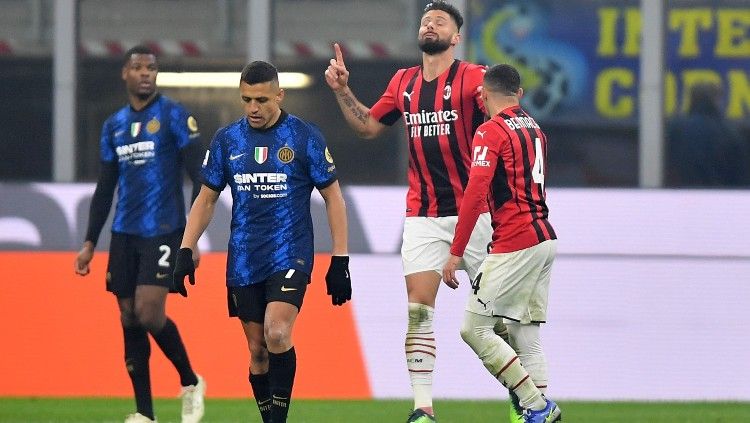 Olivier Giroud merayakan golnya ke gawang Inter Milan di laga Derby della Madonnina (06/02/22). (Foto: REUTERS/Daniele Mascolo) Copyright: © REUTERS/Daniele Mascolo