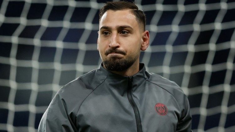 Berikut deretan nasib sial kiper Timnas Italia yakni Gianluigi Donnarumma setelah memutuskan meninggalkan AC Milan dan bergabung ke PSG. (Foto: REUTERS/Benoit Tessier) Copyright: © REUTERS/Benoit Tessier