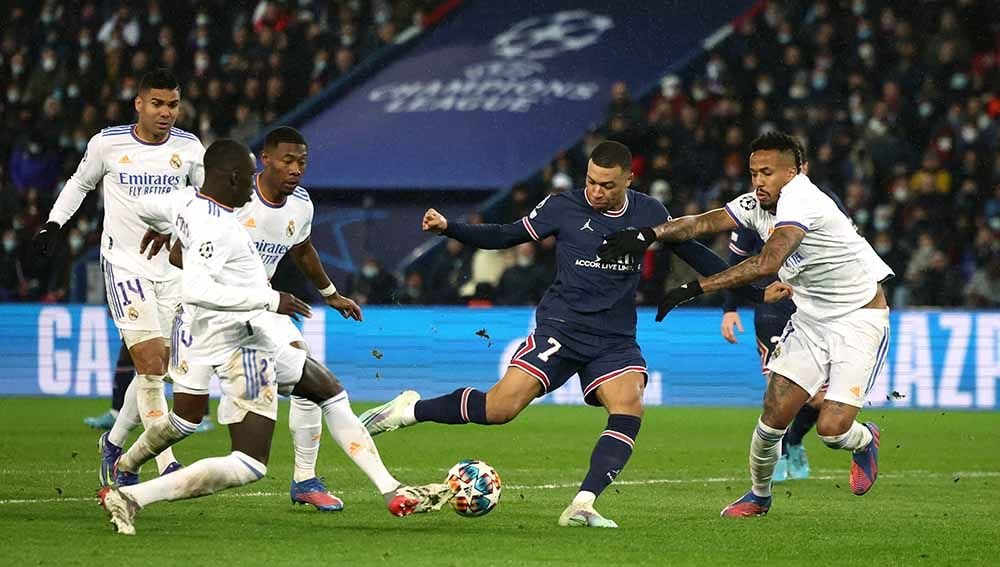 Kylian Mbappe masih belum terbuka soal masa depannya usai jadi pahlawan Paris Saint-Germain di leg pertama babak 16 besar Liga Champions kontra Real Madrid. Copyright: © REUTERS/Sarah Meyssonnier