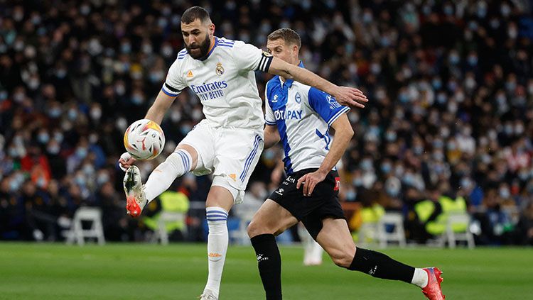 Berikut hasil pertandingan pekan ke-25 Liga Spanyol 2021/22 yang mempertemukan Real Madrid vs Alaves pada Minggu (20/02/22). Copyright: © REUTERS/Juan Medina