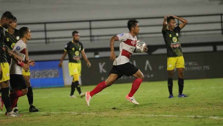 Madura United berhasil membobol gawang Barito Putera. FOTO: MO Madura Utd Copyright: © MO Madura Utd