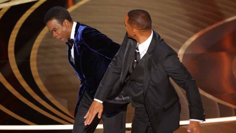 Will Smith pukul Chris Rock di Panggung Oscar 2022. Foto: Reuters/Brian Snyder Copyright: © Reuters/Brian Snyder