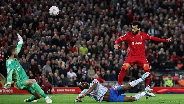 Mohamed Salah mencetak gol di laga Liverpool vs Manchester United (REUTERS/Phil Noble) Copyright: © REUTERS/Phil Noble