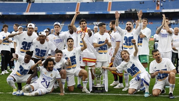 Real Madrid resmi menjadi juara Liga Spanyol musim ini, dan menorehkan beberapa rekor fantastis. (REUTERS/Susana Vera) Copyright: © REUTERS/Susana Vera