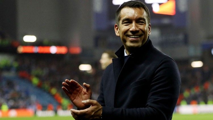 Ekspresi bahagia Giovanni van Bronckhorst usai bawa Rangers ke final Liga Europa (06/05/22). (Foto: REUTERS/Russell Cheyne) Copyright: © REUTERS/Russell Cheyne