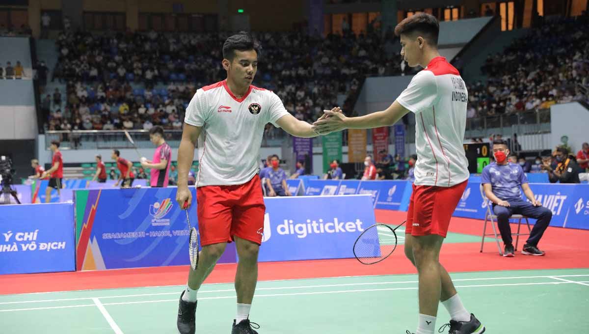 Pasangan ganda putra Indonesia, Pramudya Kusumawardana/Yeremia Rambitan, mengaku kewalahan usai menang melawan Thailand di semifinal SEA Games 2021. Copyright: © PBSI