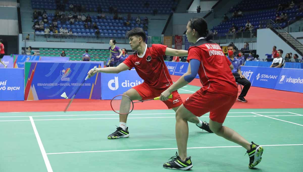 Dilanda cedera hingga harus mundur dari Indonesia Masters 2022, ganda campuran ranking 28 dunia, Adnan Maulana/Mychelle Crhystine Bandaso, sedih dengan hal itu. Copyright: © PBSI
