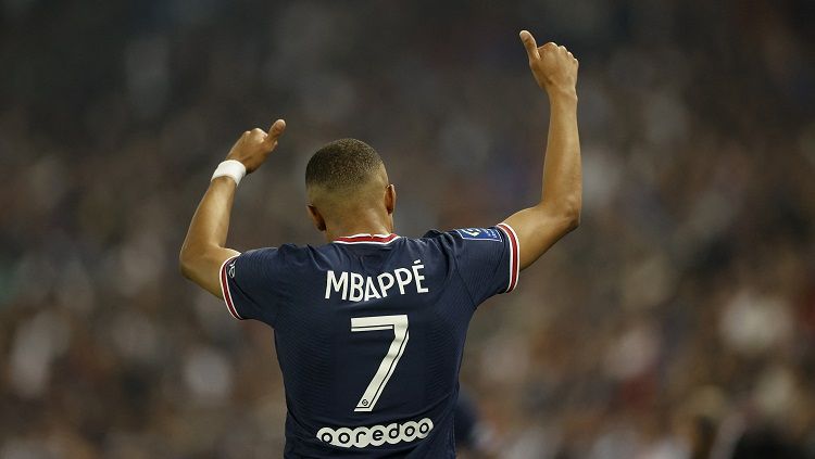 Kylian Mbappe tegas tepis isu jika dirinya minta Paris Saint-Germain depak sejumlah pemain dan pelatihnya usai diberi kekuatan lebih pasca perpanjangan kontrak.(REUTERS/Christian Hartmann) Copyright: © REUTERS/Christian Hartmann