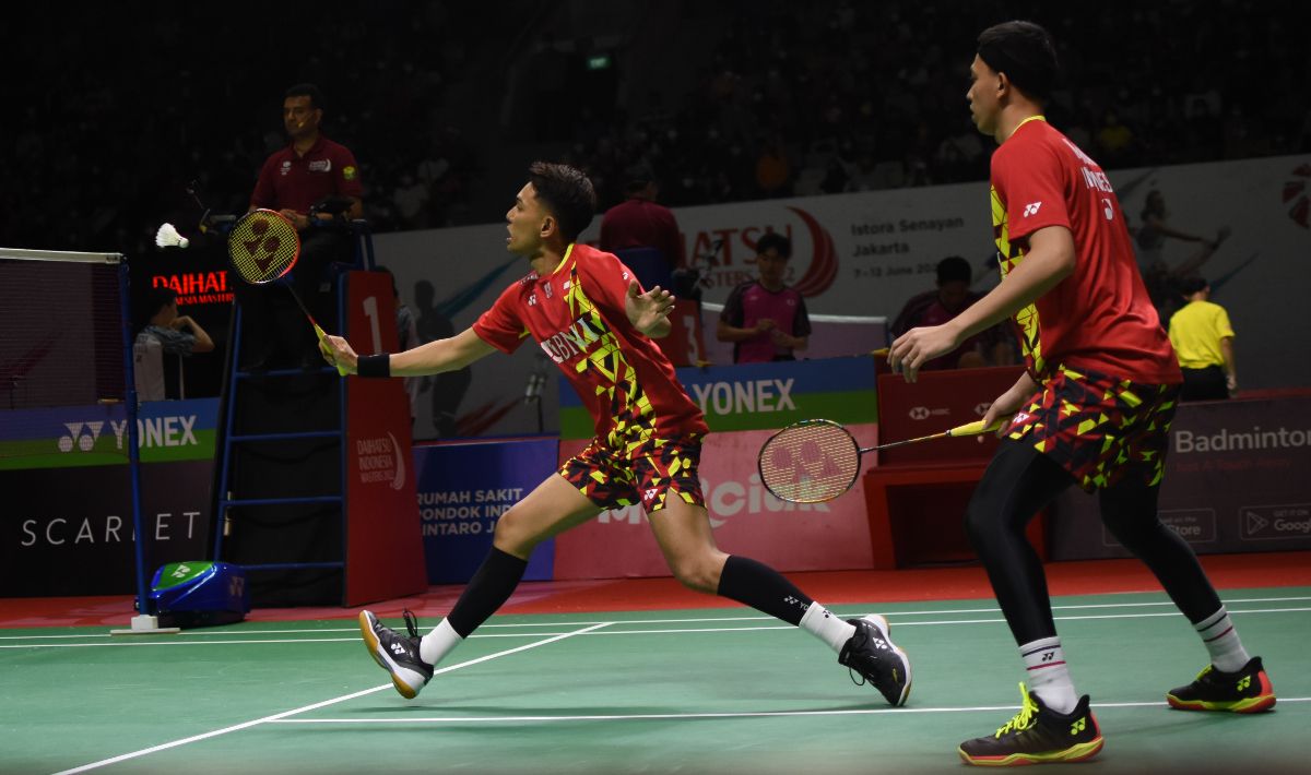 Menangi 'perang saudara' lawan Fajar Alfian/Muhammad Rian Ardianto, Pramudya Kusumawardana/Yeremia Rambitan ke perempat final Indonesia Masters 2022. Copyright: © Herry Ibrahim/INDOSPORT