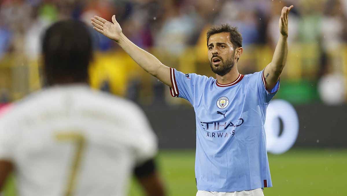 Bernardo Silva akui bahagia bela Manchester City namun jika takdir menggiringnya keluar dari Liga Inggris menuju Barcelona di bursa transfer ini ia siap saja. Foto: REUTERS/Bernardo Silva Copyright: © REUTERS/Jeff Hanisch