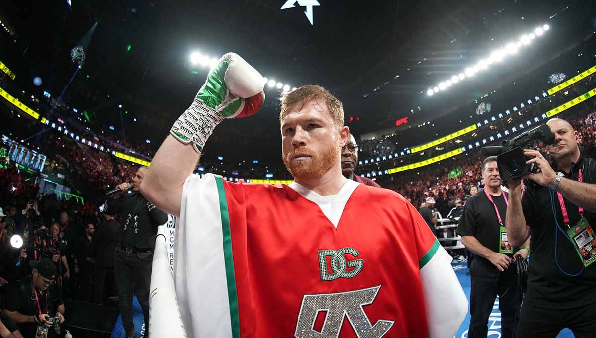 Canelo Alvarez raja tinju dunia ancam hajar Lionel Messi. Foto: REUTERS/Joe Camporeale Copyright: © REUTERS/Joe Camporeale