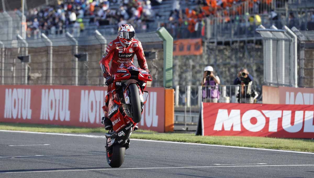 Aksi pembalap Ducati Jack Miller merayakan kemenangannya. Foto: REUTERS/Issei Kato Copyright: © REUTERS/Issei Kato