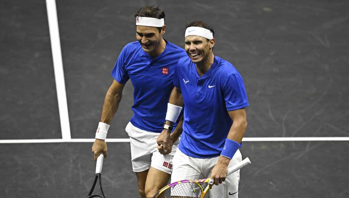Roger Federer dan Rafael Nadal di Laver Cup 2022. Foto: REUTERS/Dylan Martinez. Copyright: © REUTERS/Dylan Martinez