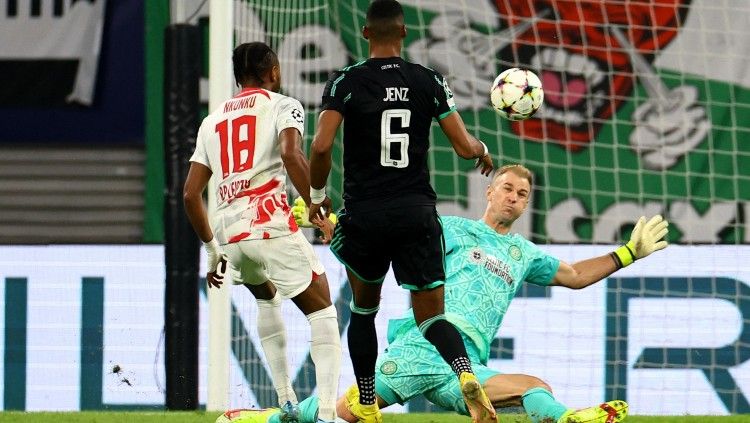 Christopher Nkunku mencetak gol yang kemudian dianulir di laga RB Leipzig vs Celtic (05/10/22). (Foto: REUTERS/Lisi Niesner) Copyright: © REUTERS/Lisi Niesner