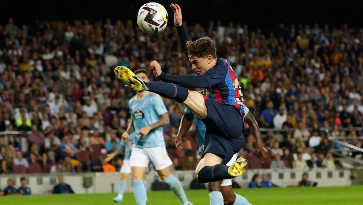 Aksi Gavi di laga Barcelona vs Celta Vigo (10/10/22). (Foto: REUTERS/Albert Gea) Copyright: © REUTERS/Albert Gea