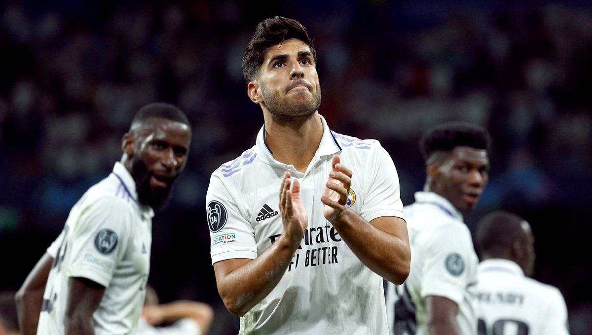 Penyerang andalan Real Madrid, Marco Asensio rupanya memutuskan hengkang dari Los Blancos pada musim panas mendatang, dan ingin menjajal panasnya Liga Inggris. Copyright: © Reuters/Susana Vera