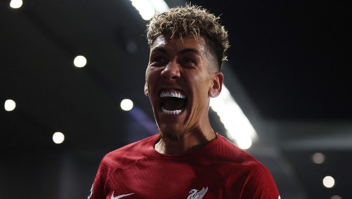 Klub raksasa Liga Italia, Inter Milan, disebut akan mendatangkan penyerang Liverpool, Roberto Firmino, yang akan habis kontrak pada musim panas 2023. Copyright: © Reuters/Lee Smith