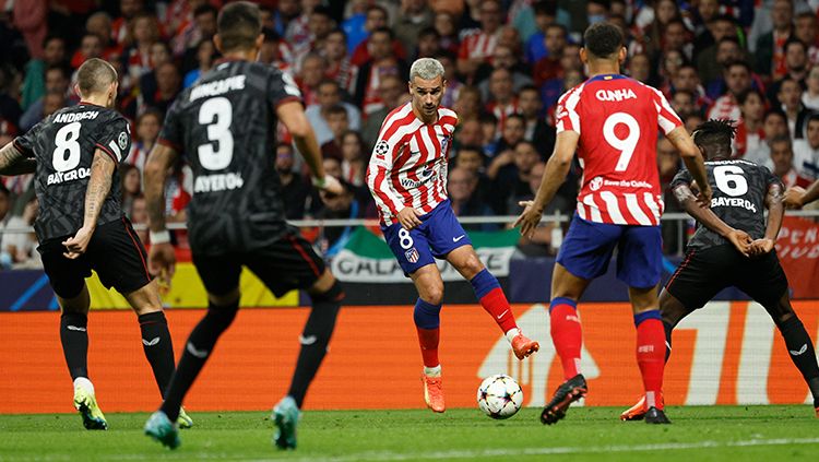 Atletico Madrid melawan Bayer Leverkusen di Liga Champions. Copyright: © REUTERS/Susana Vera