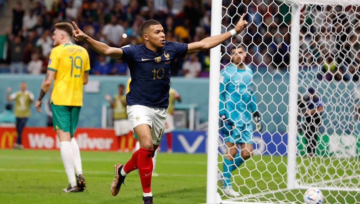 Selebrasi pemain Prancis Kylian Mbappe merayakan gol ketiga di pertandingan Grup D Piala Dunia Qatar 2022. (Foto: REUTERS/Issei Kato) Copyright: © REUTERS/Issei Kato