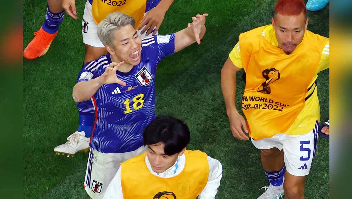 Aksi selebrasi pemain Jepang Takuma Asano usai menjebol gawang Jerman di Piala Dunia Qatar 2022. (Foto: REUTERS/Fabrizio Bensch) Copyright: © REUTERS/Fabrizio Bensch