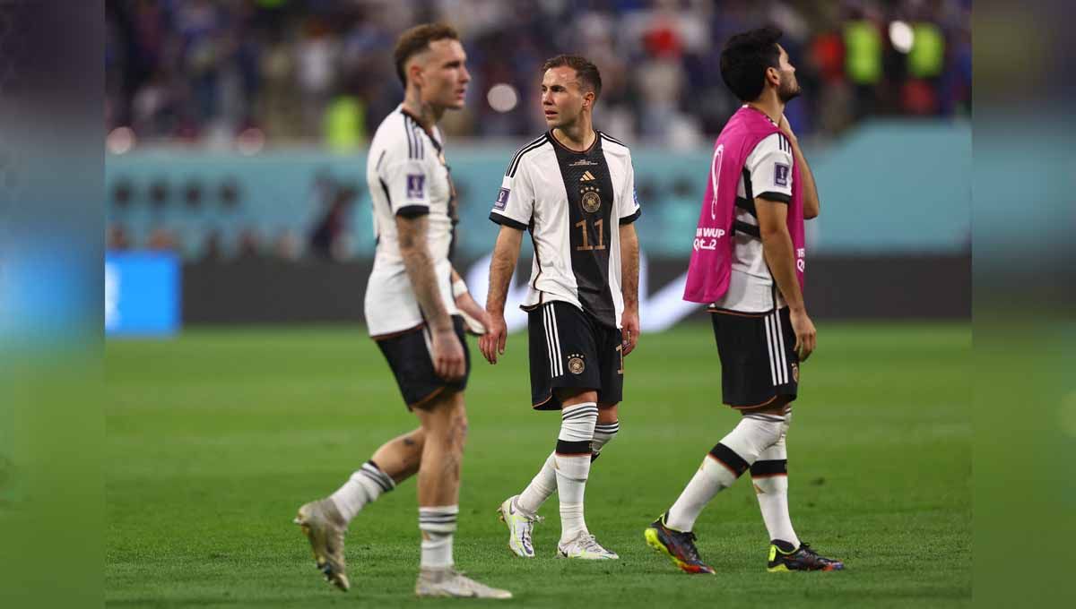 Pemain Jerman Mario Gotze terlihat sedih timnya kalah dari Jepang di Piala Dunia Qatar 2022. (Foto: REUTERS/Kai Pfaffenbach) Copyright: © REUTERS/Kai Pfaffenbach