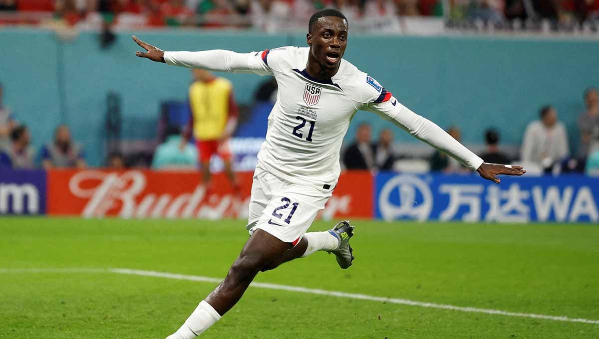 Selebrasi pemain Amerika Serikat Timothy Weah usai menjebol gawang Wales di grup B Piala Dunia Qatar 2022. (Foto: REUTERS/John Sibley) Copyright: © REUTERS/John Sibley