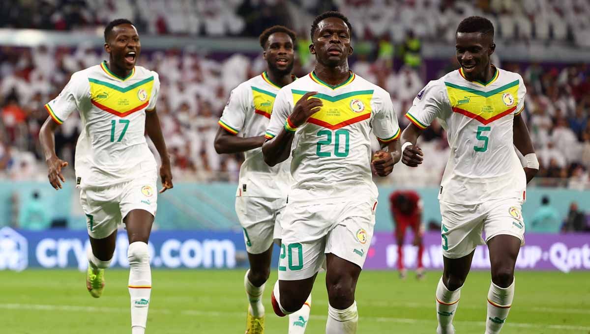 Selebrasi pemain Senegal Bamba Dieng merayakan gol ketiganya bersama rekan setimnya di grup A Piala Dunia Qatar 2022. (Foto: REUTERS/Kai Pfaffenbach) Copyright: &copy; REUTERS/Kai Pfaffenbach