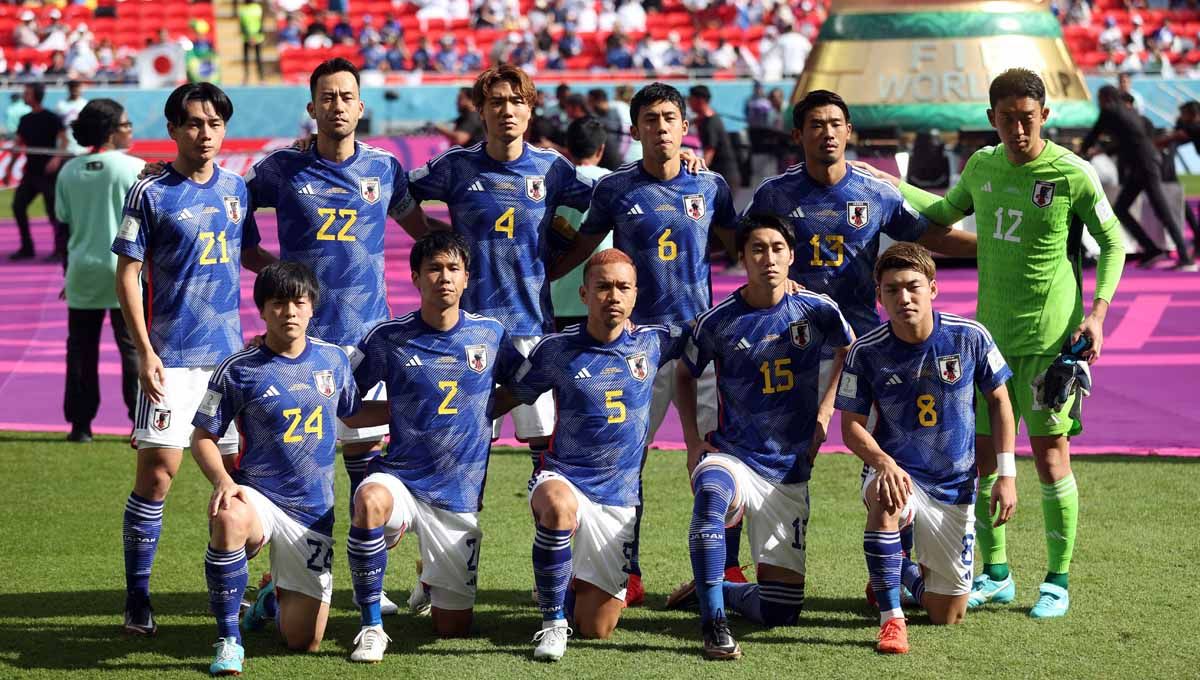 Skuat Timnas Jepang berpose untuk foto di grup E sebelum pertandingan. (Foto: REUTERS/Carl Recine) Copyright: © REUTERS/Carl Recine