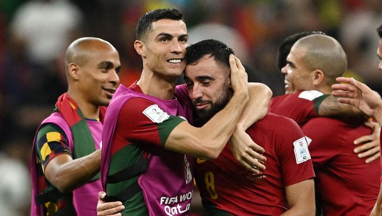 Timnas Portugal memastikan diri lolos ke babak 16 besar Piala Dunia 2022 (Foto: REUTERS/Dylan Martinez). Copyright: © REUTERS/Dylan Martinez