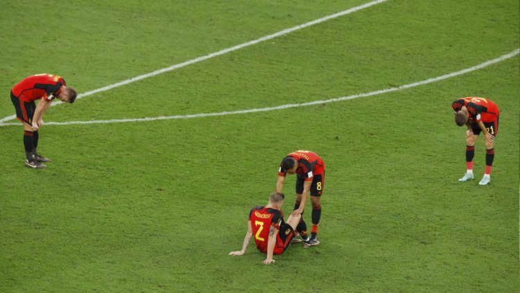 Ekspresi kekecewaaan para pemain Timnas Belgia usai dipastikan gagal melaju ke babak 16 besar Piala Dunia 2022 (Foto: REUTERS/Albert Gea). Copyright: © REUTERS/Albert Gea