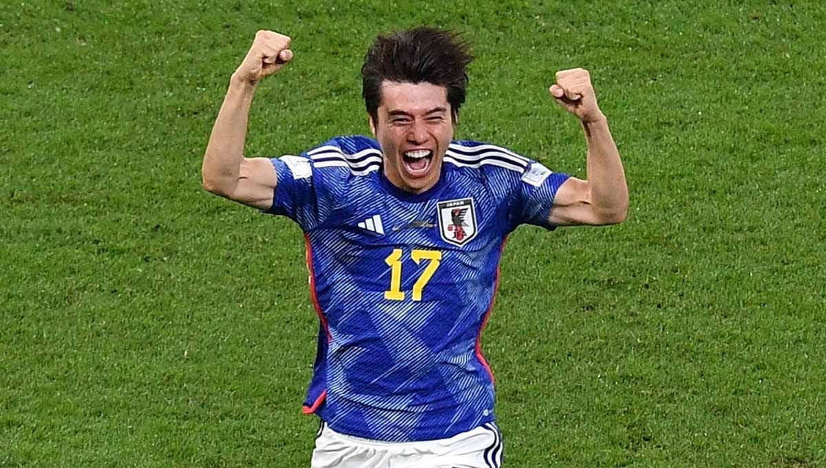 Selebrasi pemain Jepang Ao Tanaka merayakan gol ke gawang Spanyol di Grup E Piala Dunia 2022. Foto: REUTERS/Jennifer Lorenzini. Copyright: © REUTERS/Jennifer Lorenzini