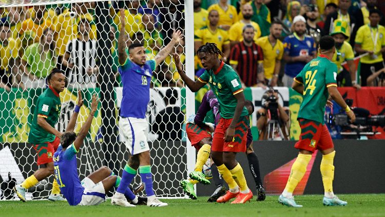 Reaksi Christopher Wooh dari Kamerun dan Gabriel Jesus dari Brasil di Piala Dunia 2022 REUTERS-Hamad I Mohammed Copyright: © REUTERS-Hamad I Mohammed