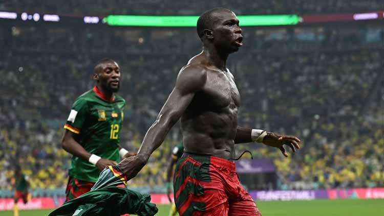 Pemain Kamerun Vincent Aboubakar merayakan gol pertamanya Copyright: © REUTERS/Dylan Martinez